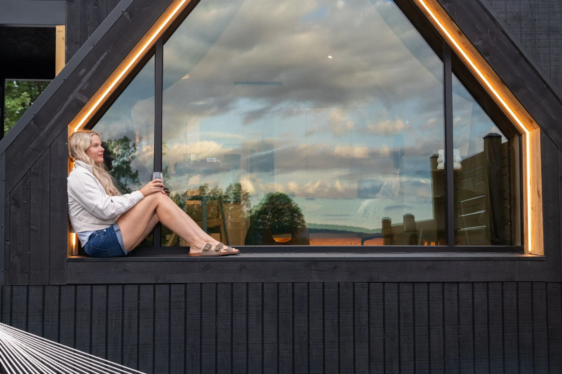 Guests relaxing inside a cabin at Sky Mountain Retreat